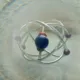 un positrón de antimateria